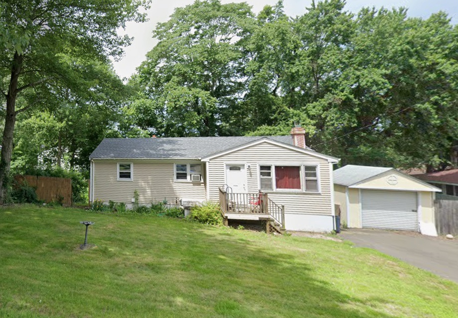 Front exterior of updated 4-bedroom ranch at 86 Crest Avenue in East Haven CT.
