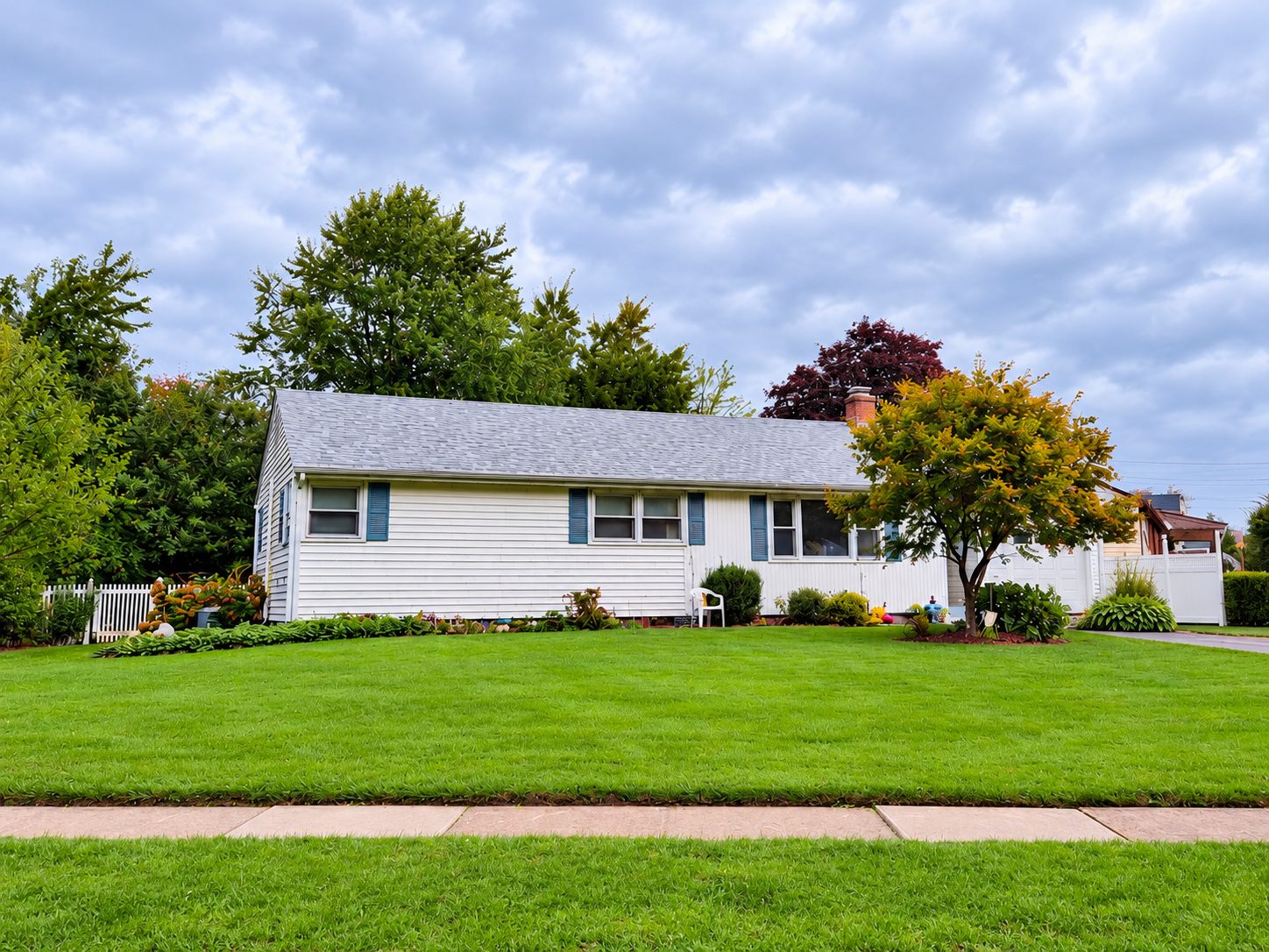 51 Meadow Park Drive in Milford CT, a three-bedroom ranch home with attached garage and landscaped front yard.